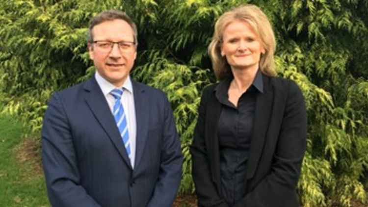 Claire Watson, the accountable officer for Cheshire CCG, with Sandbach GP Dr Andrew Wilson (left).