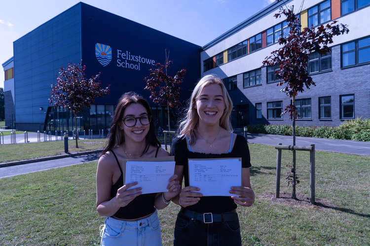 Look mum and dad - I did it... Katie Combe and head girl Charlotte Taylor with their results