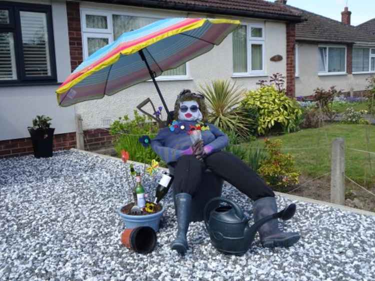 Gardener enjoying a glass of wine.