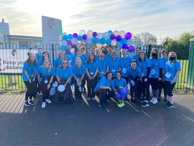 Wistaston Academy staff after completing the near 1,000-mile trip to raise money for Acacia.