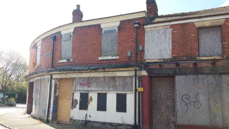 The one-time offices of the Crewe Chronicle are rotting away.