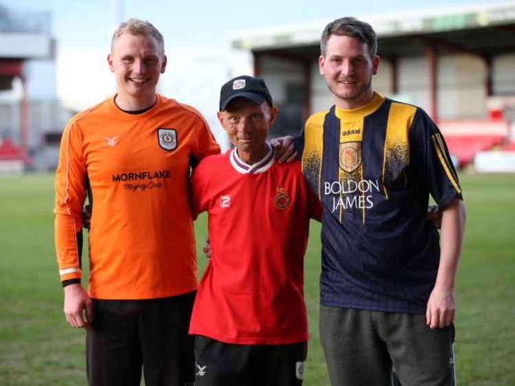 Andy Scoffin with his sons, Ashley and Warren.