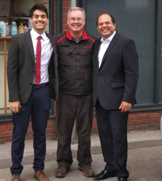 Roger and Raj pictured with Raj's son, Jainil Patel, the clinical lead at Hollowood Vaccination Centre.