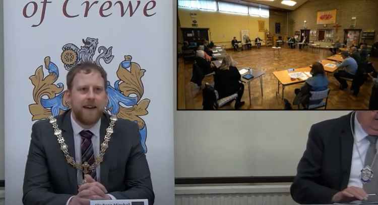 Cllr Benn Minshall bows out as mayor as members meet up face-to-face again.