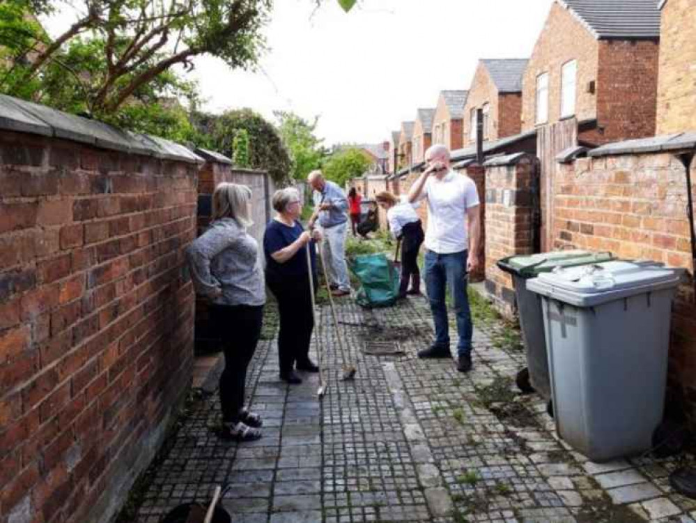 MP Kieran Mullan was joined by volunteers to spruce up Crewe alleyways.