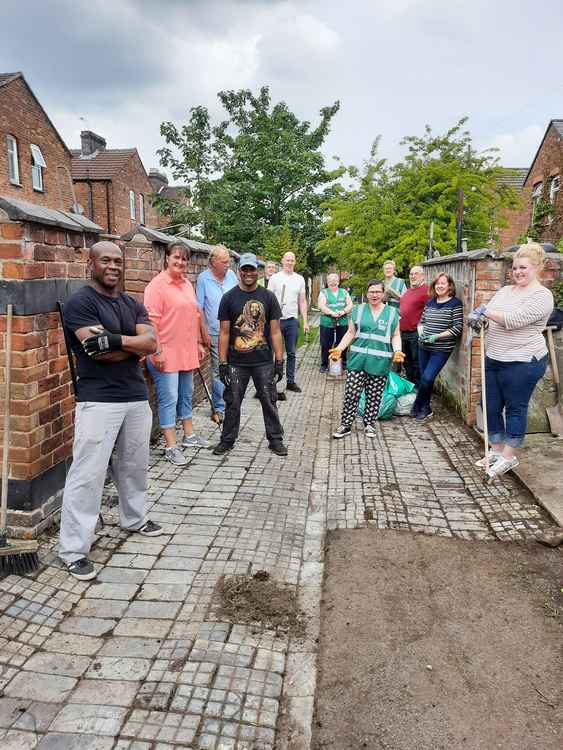 Kieran is joined by volunteers for last weekend's alley clean-up.