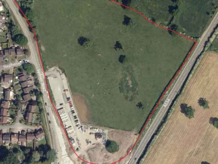 The site of the proposed estate (outline marked red) north of Crewe Green roundabout.