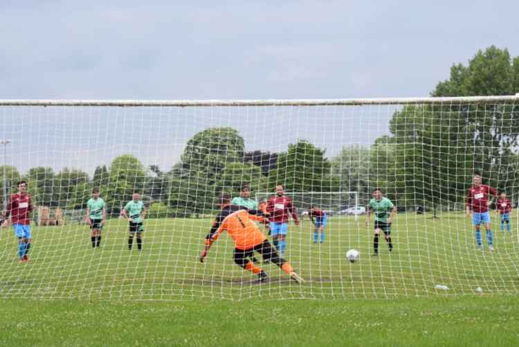 Talbot score their fifth from the penalty spot (Pic: Jonathan White).