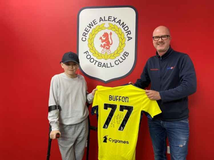 Ashton is presented with the Italian goalkeeping legend's signed shirt by Dominic McGarry.