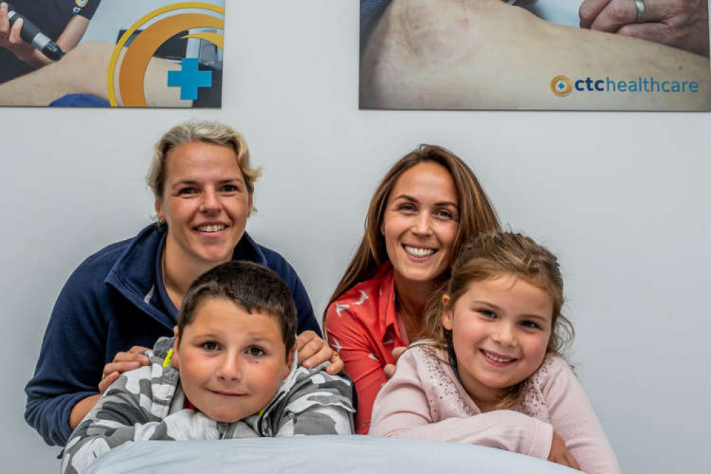 Physiotherapist Serena Proctor (left) and Emily Carter of ctchealthcare with their children.