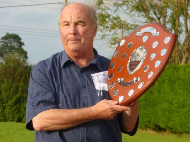 The late John White presents an award at a South/Mid Cheshire Tennis League Presentation Day.