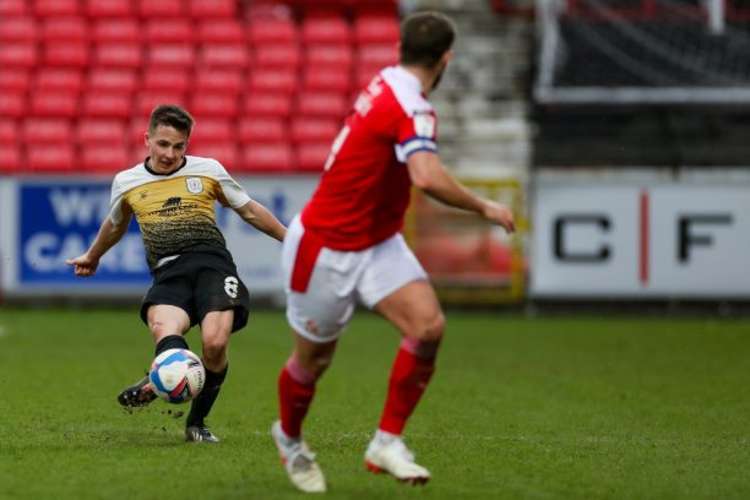 Lowery (in action last season against Swindon) has been told he won't play unless he signs new deal.