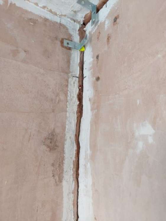 Cracks appeared in walls.