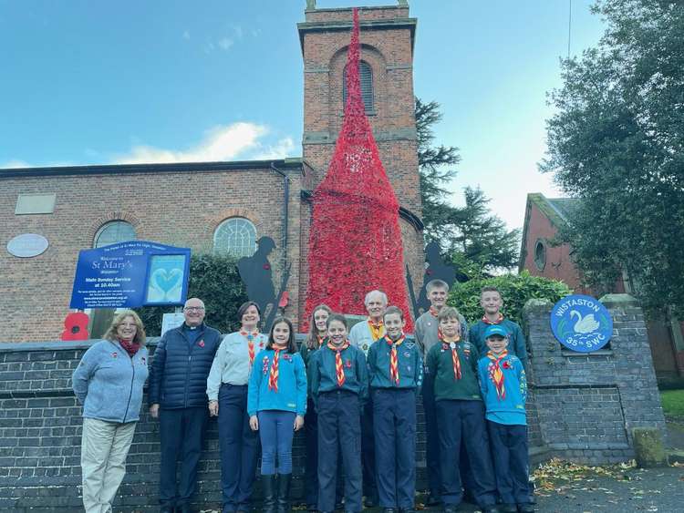 The Rev. Mike Turnbull of St Mary's Wistaston with 35th South West Cheshire (Wistaston) Scout Group members.