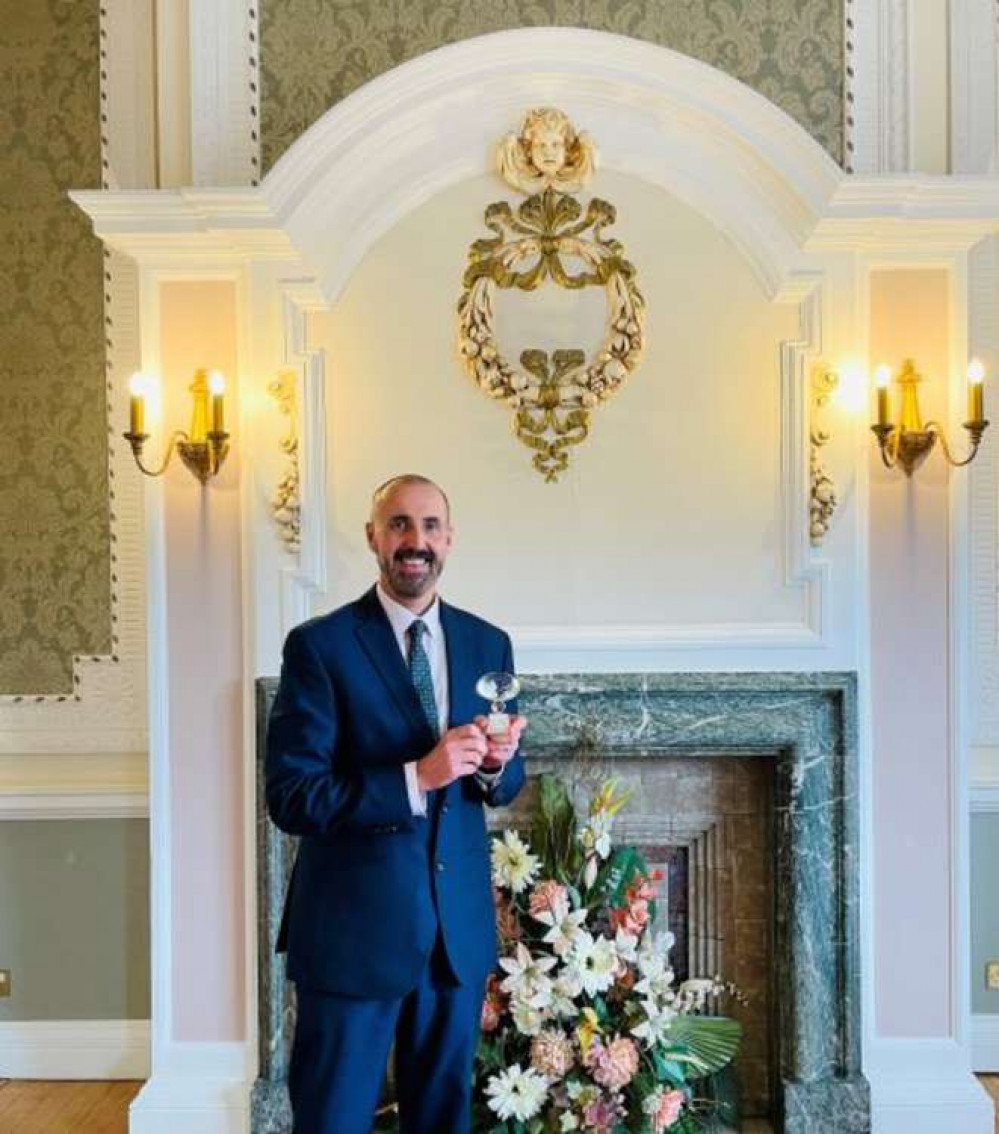 Andrew Foster, lead ceremony co-ordinator for Cheshire East Registration Service with the award for best North West ceremony provider