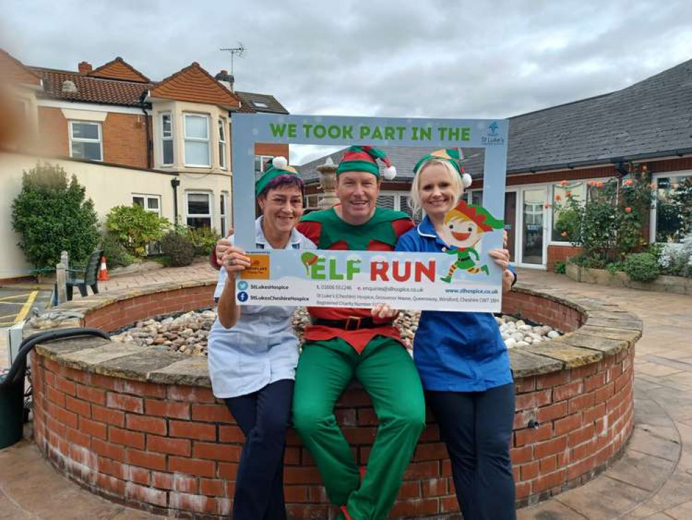 Hospice corporate fundraiser Andy Bailey (centre) with nursing assistant Adele Capper and staff nurse Nicola Thompson helping to launch the Elf Run 2021