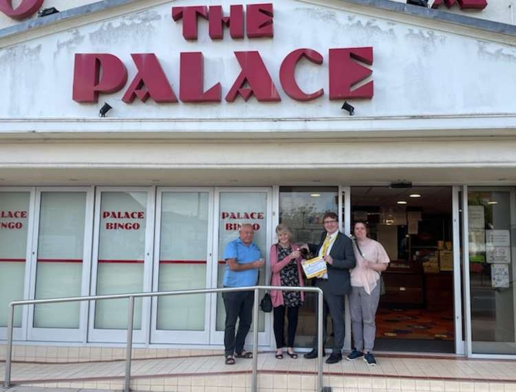 Winner Carol Fulcher and husband Joe from Felixstowe being presented with cheque by managing director Patrick Duffy (Pictured credit: The Palaces)