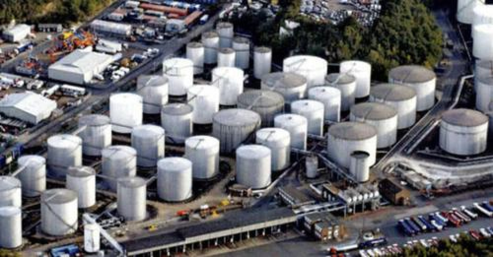 Protesters have placed themselves in dangerous positions on a petrol tank site in Thurrock. 