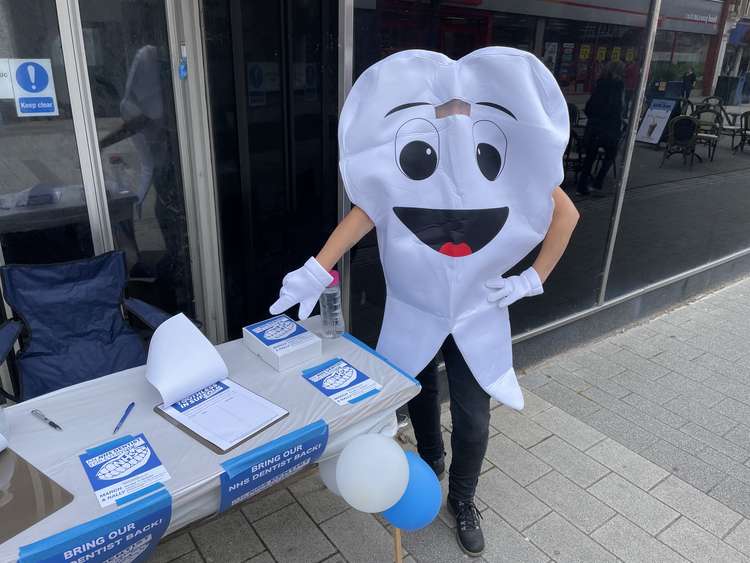 Toothless in Suffolk mascot Flossy campaigning in Felixstowe