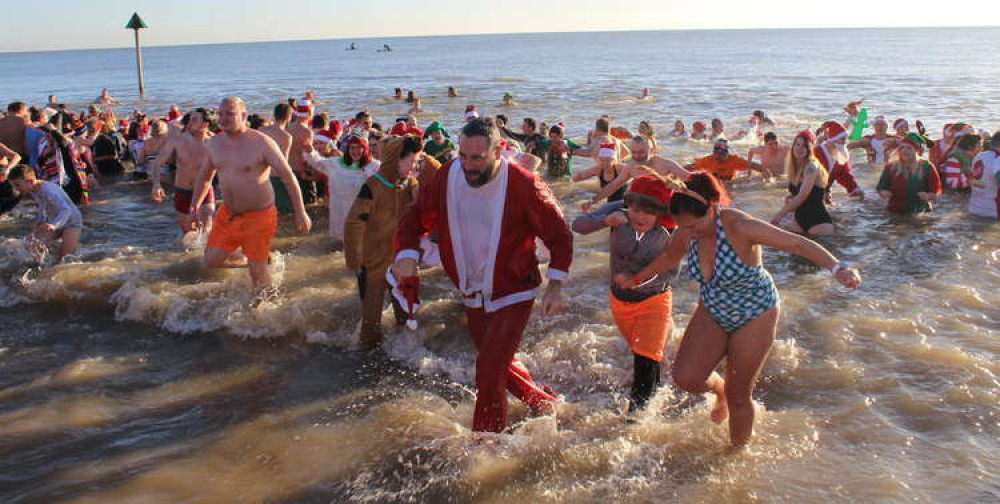 Supporters taking the Christmas Day dip in 2019 (Picture credit: St Elizabeth Hospice)