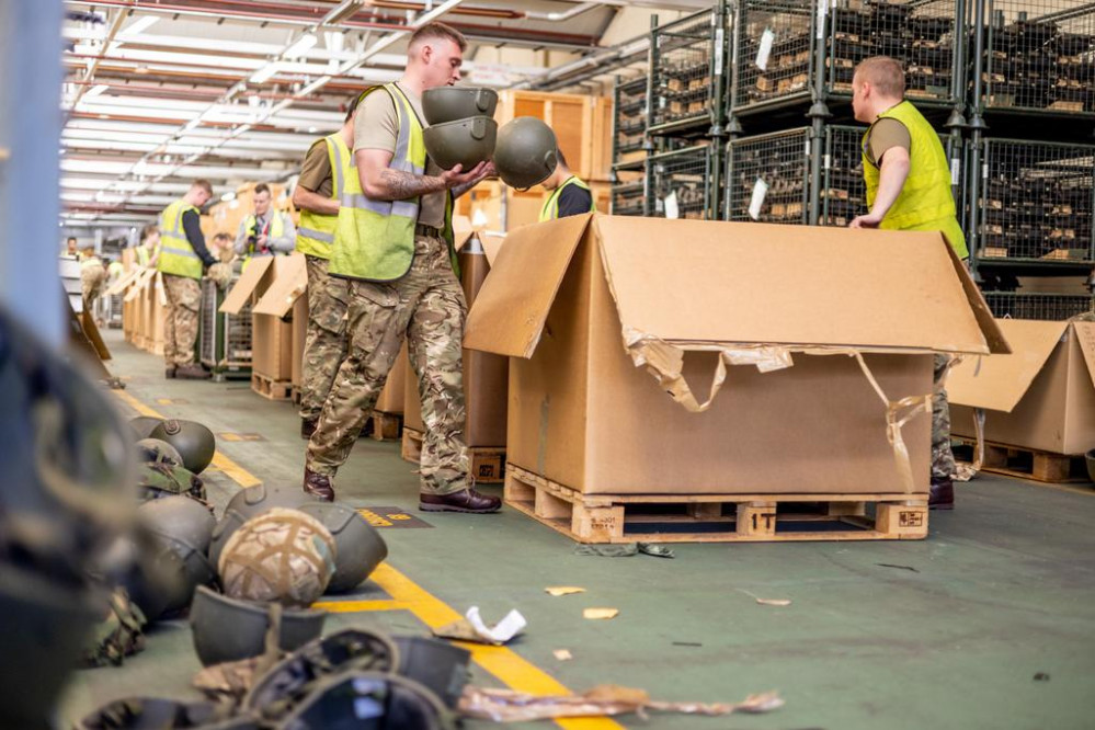 The Royal Anglian Regiment packing helmets (image courtesy of the Crown)