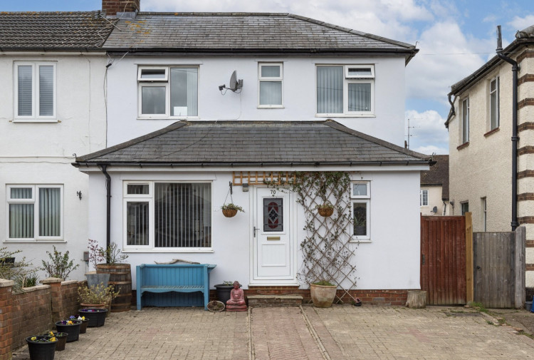 This semi-detached home has been extended to front and rear giving a very spacious ground floor with two generous reception rooms, large kitchen, and bathroom. To the first floor there are three bedrooms