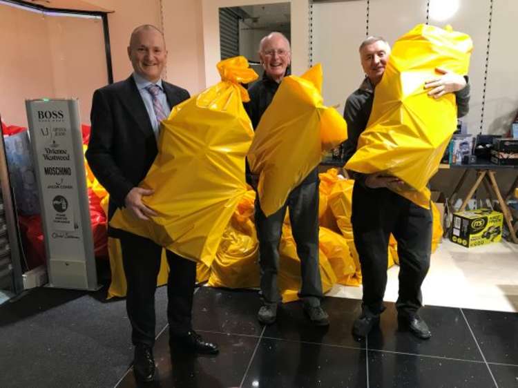 Swansway Group Director John Smyth with Tony Murphy and Ray Stafford of Bolton Lions.