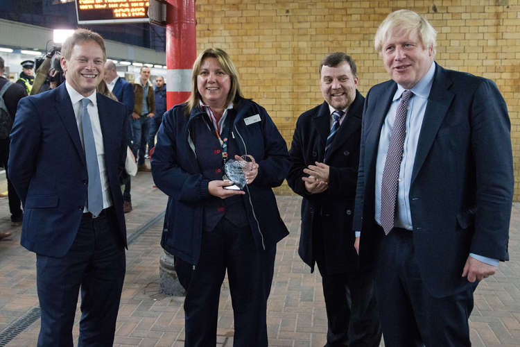 Jennifer Birdsall receives her Railway Benefit Fund award from the PM and Grant Shapps (left).