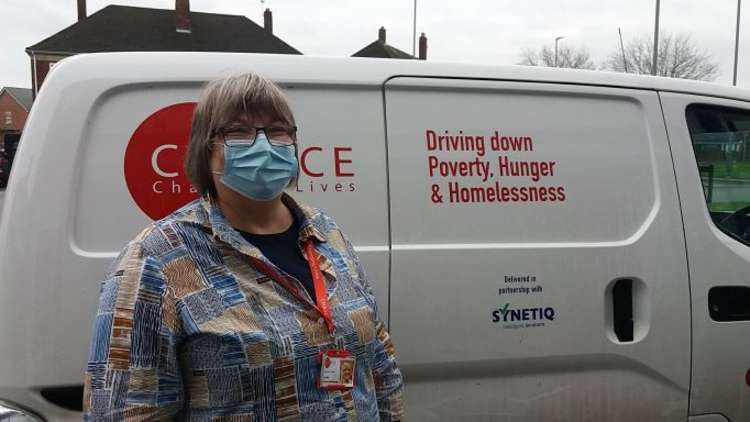 Michele with the charity's electric van.