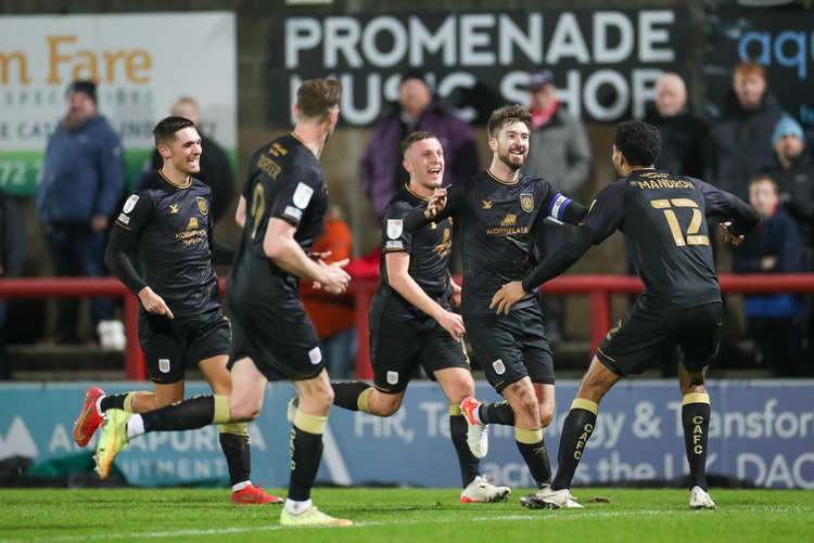 Luke Murphy celebrates after striking the second-half winner (Picture credit: Kevin Warburton).