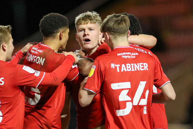 Scott Robertson (facing) celebrates his second-half scorcher which levelled the tie at 2-2 (Picture credit: Kevin Warburton).