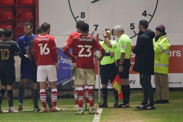 Referee Rob Lewis is the centre of attention in stoppage time (Picture credit: Kevin Warburton).