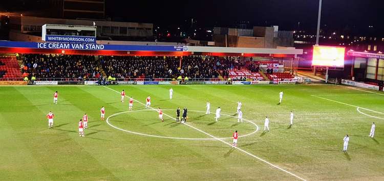 Both teams ready for the match to kick off.