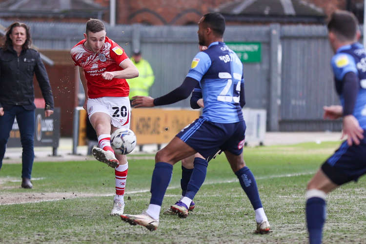 Josh Lundstram is closed down by Jordan Obita  (Picture credit: Kevin Warburton).