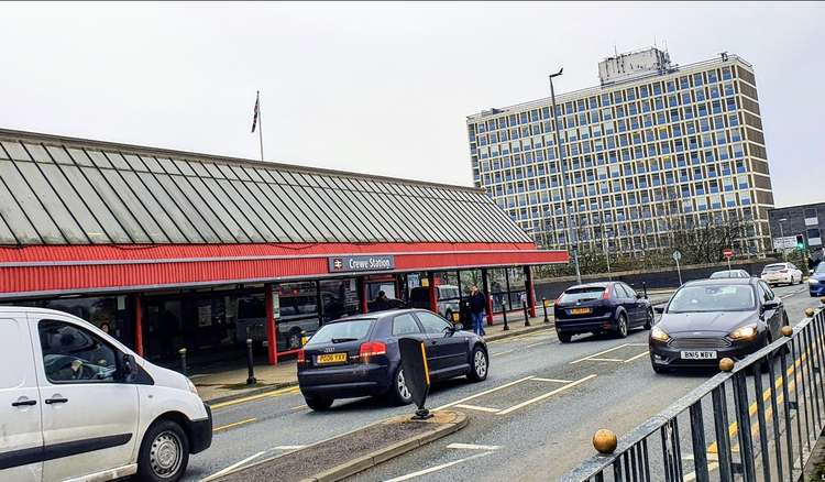 Crewe Train Station with Rail House in the distance.