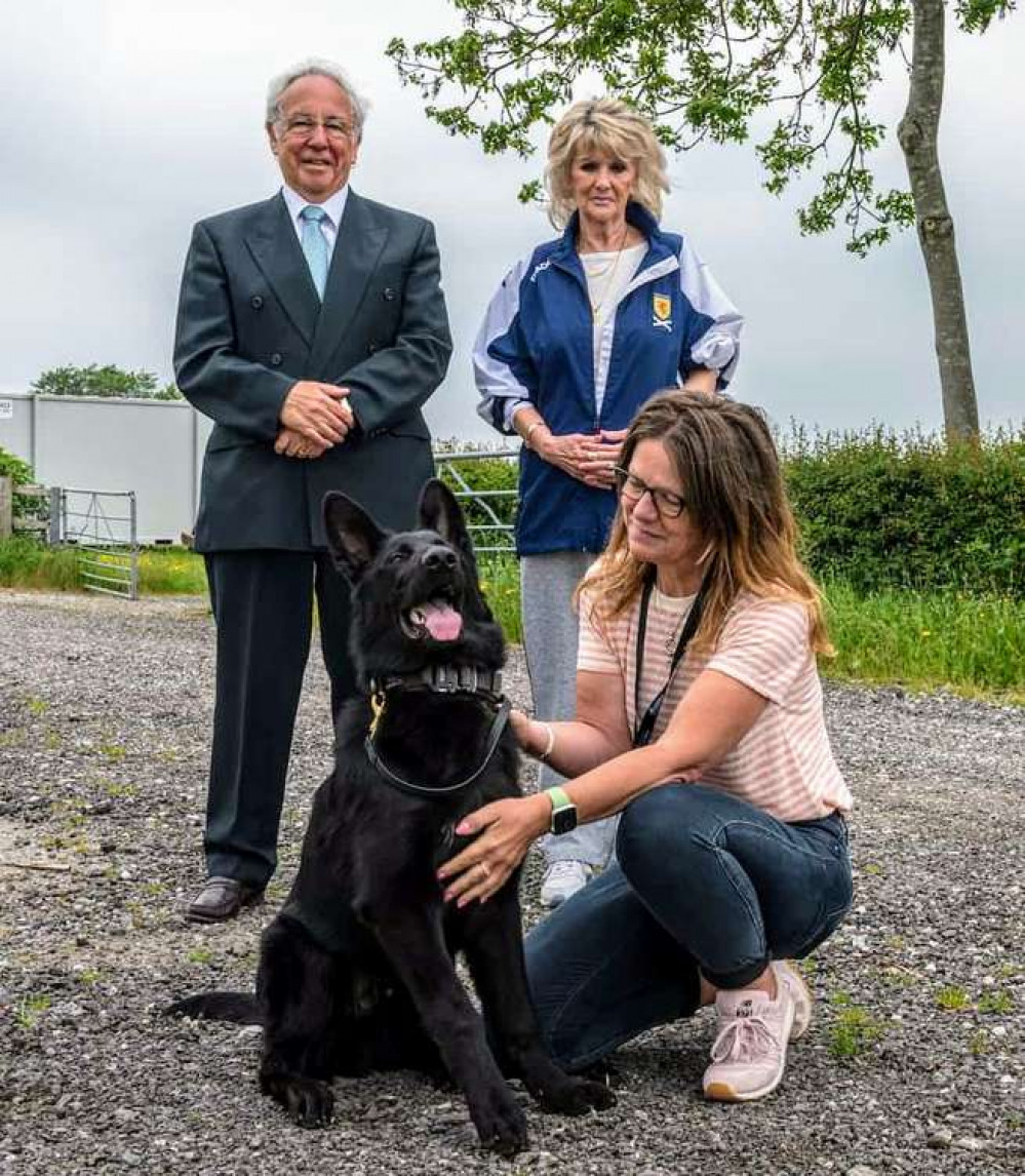 Police and Crime Commissioner John Dwyer with Dog Welfare Volunteers and Police Dog.