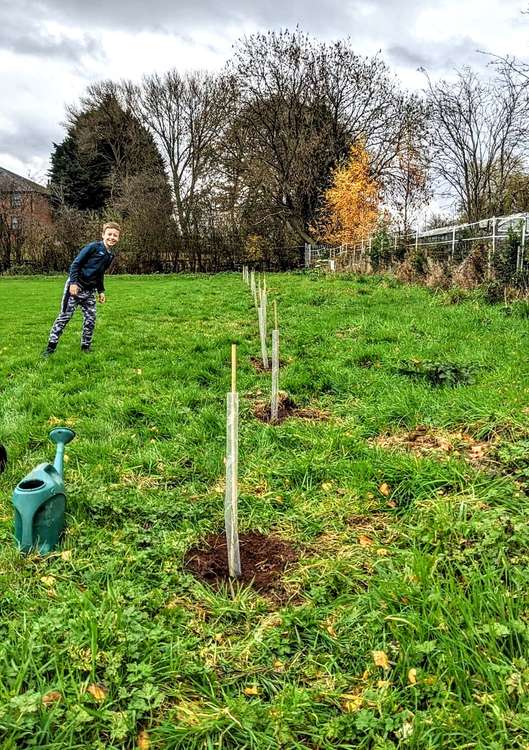 Cheshire Blades planting trees on a nature walk in 2020.