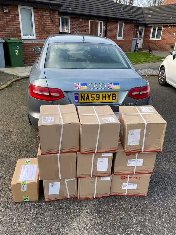 Boxes of supplies that Stephen is taking in his car to Ukraine.