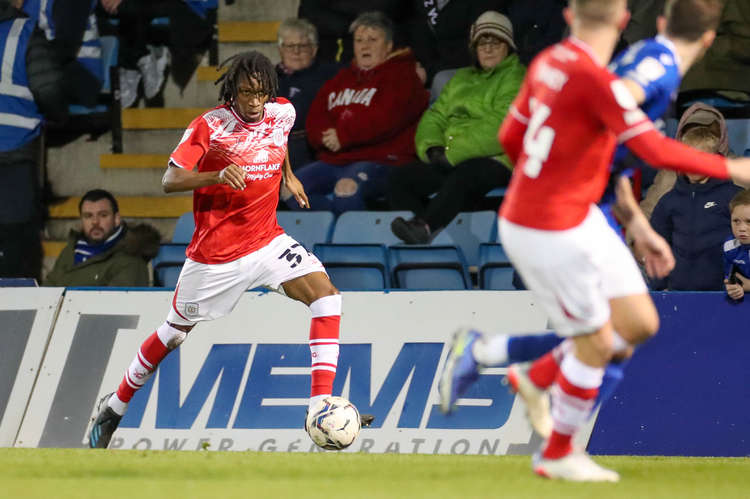 New recruit Tariq Uwakwe in action in February's defeat at Gillingham - Crewe cannot afford to lose to any of their drop rivals in the run-in (Picture credit: Kevin Warburton).