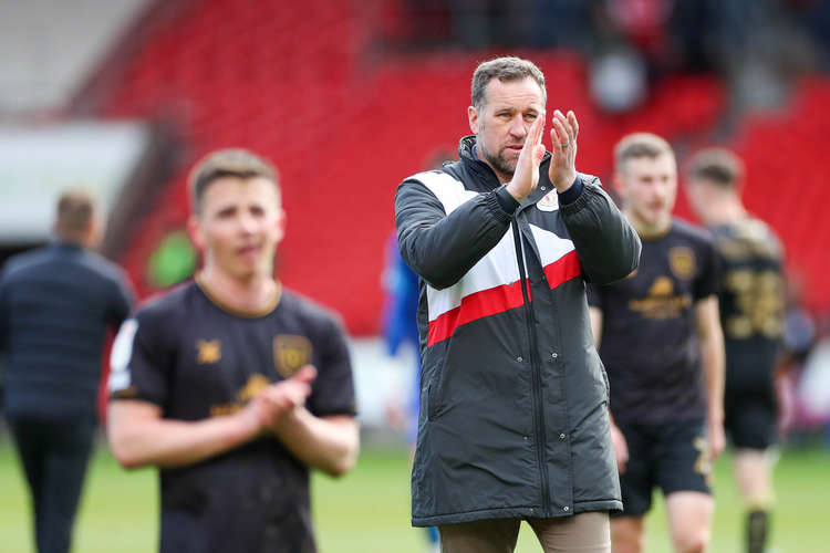 Dave Artell and Tommy Lowery clap the travelling faithful at the whistle (Picture credit: Kevin Warburton).