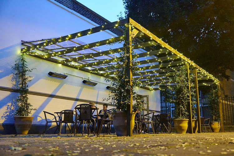 A small patio to enjoy your drinks on those warmer evenings (credit: Aspen & Meursault)
