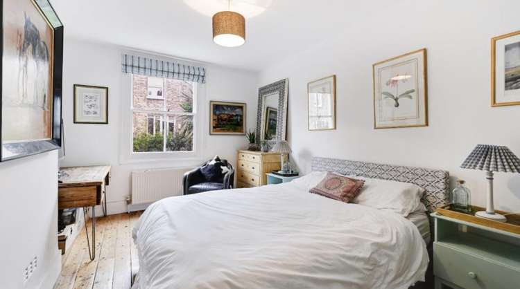 The property features three double bedrooms (credit: Savills)