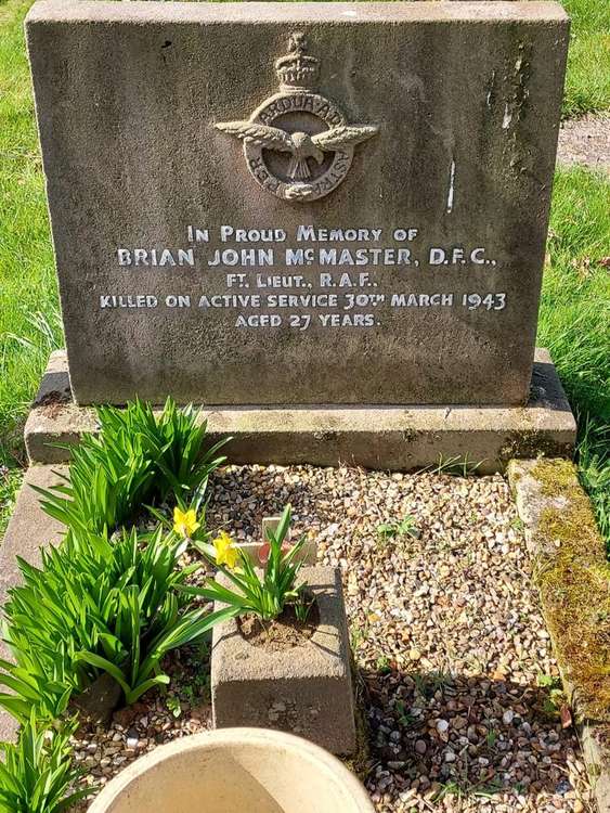 We Shall Remember Them. Second World War hero and England International: RAF Flight Lieutenant Brian McMaster. PICTURE: Letchworth Rugby Club Gravefinders team at the grave of Second World War hero and England International RAF Flight Lieutenant Brian McM