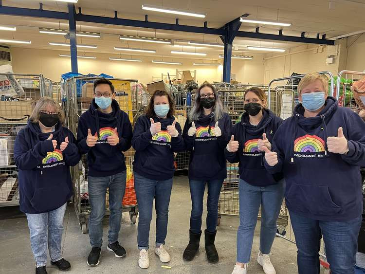 Letchworth: Garden House Hospice hail kind-hearted Raymond James volunteering work. PICTURE: The kind-hearted team at Raymond James volunteering at the Garden House Hospice distribution centre. CREDIT: @LetchworthNub