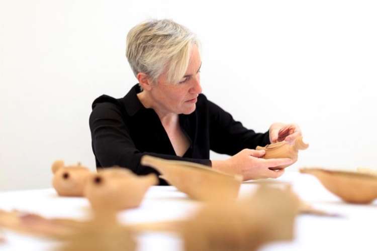 Amanda Chambers working on the ceramic pieces (Image: Max McClure)