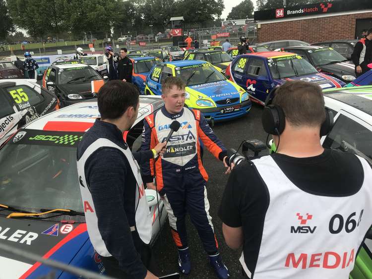 Ruben speaks to the media after his victory at Brands Hatch. Photo credit: Richard Hage.