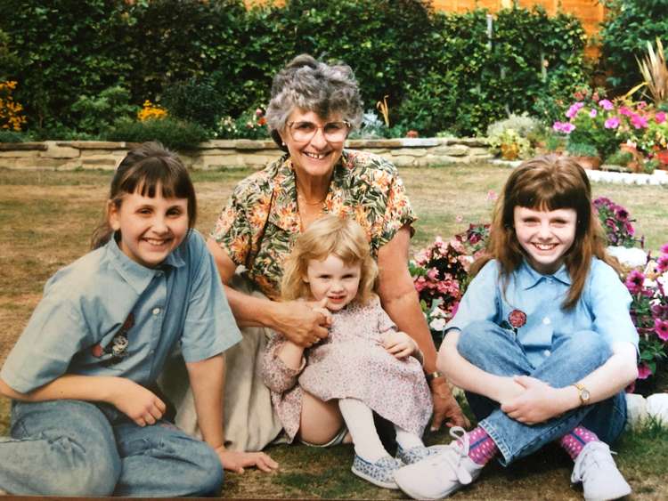 Emma with her sisters and grandmother