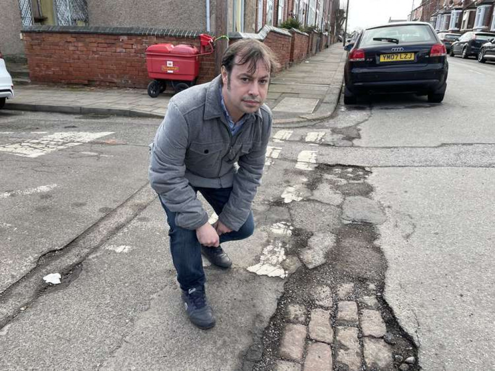 Councillor Lee Waters shows the state of the roads in Hucknall. Photo courtesy of Ashfield Independents.