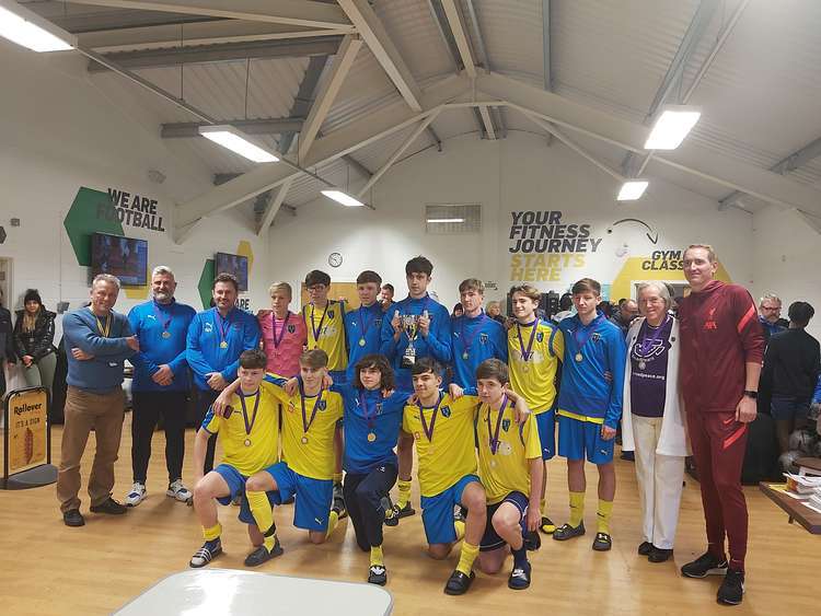 The recent RoadPeace Cup - Winners Heswall FC and (right) Pauline Fielding and former Liverpool keeper, Chris Kirkland