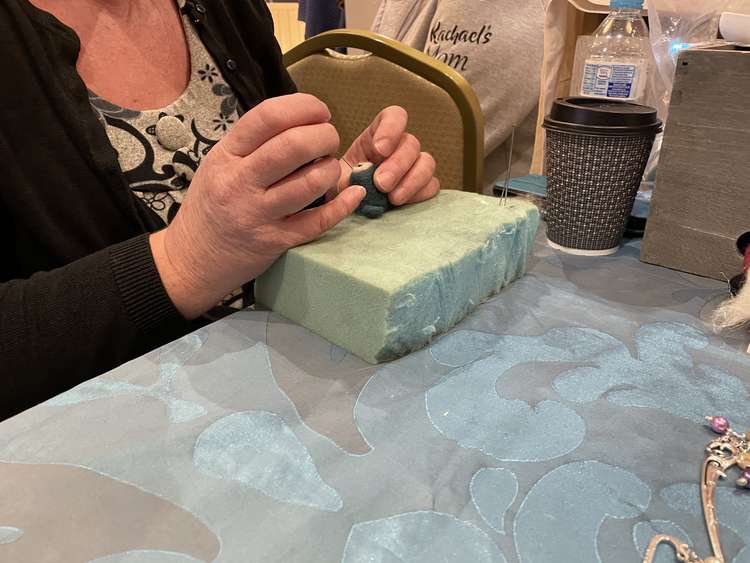 Sarah Atkinson showing us how to needle felt